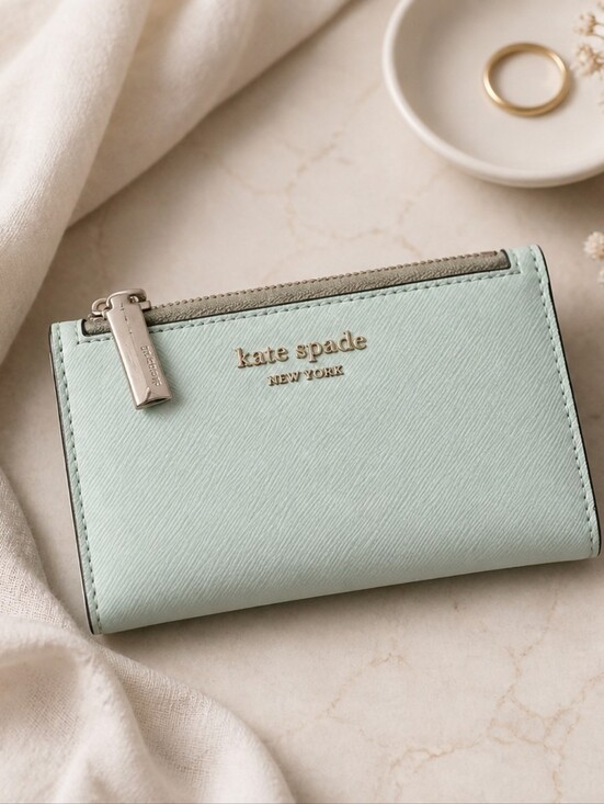 kate spade Handbags - Kate Spade Mint Green Leather Compact Wallet with Silver Accents